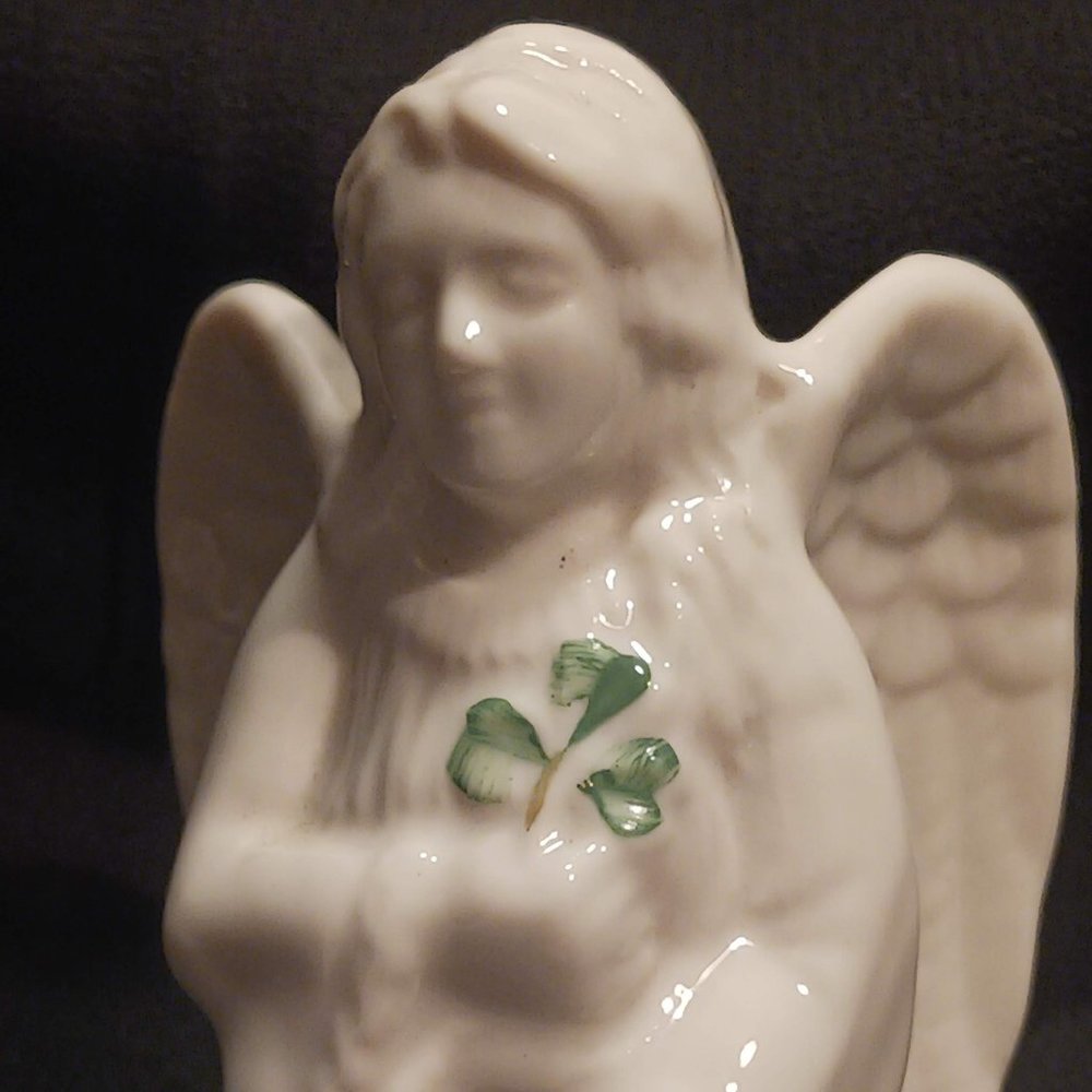Angel of protection porcelain figurine